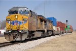 Westbound stack train eases out of the siding